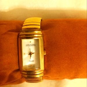 Joan Rivers classic Vintage Gold tone stretch band mother of pearl dial